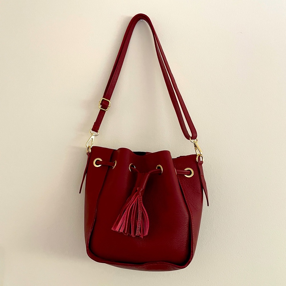 Brand new wine colored leather shoulder bag